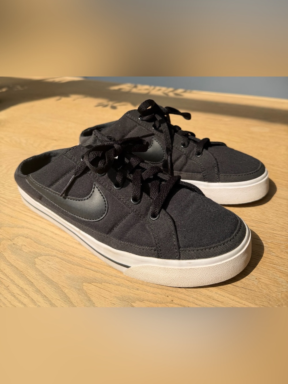 Nike Black Canvas Slip-On Lace Sneakers with White Sole